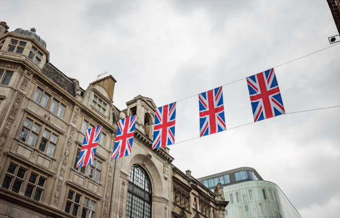 United Kingdom flags strung out across a street.