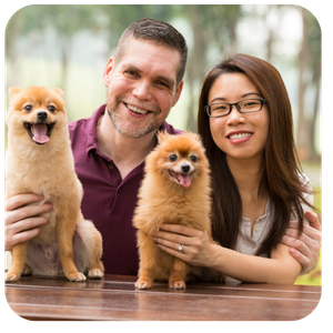 Couple with their two dogs in South Africa.